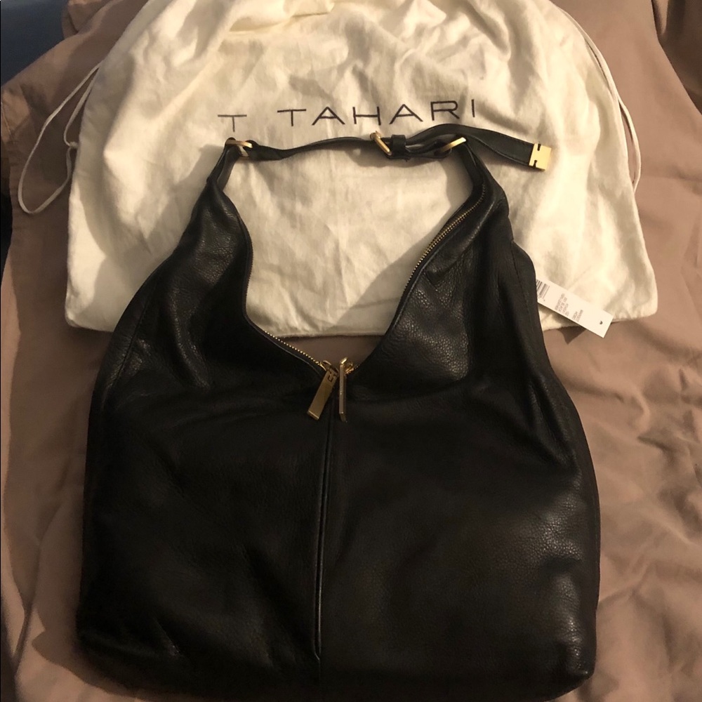 T Tahari Margot Hogo bag 100% leather.